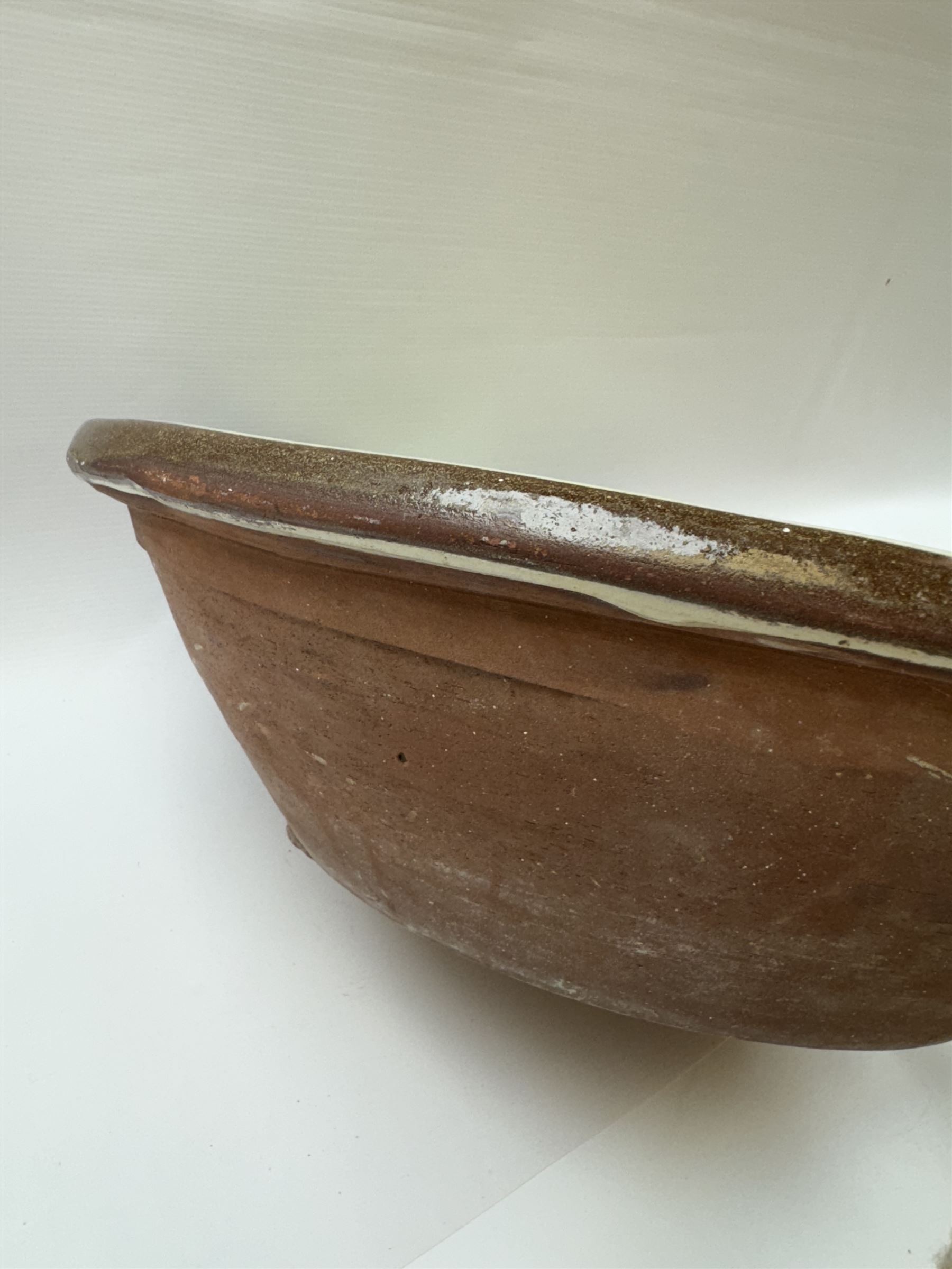 Late19th/ early 20th Century glazed earthenware dairy bowl, H14cm D50cm