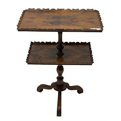20th century yew wood two-tier stand or occasional table, quarter-matched veneer tops with shaped galleries, on turned columns with splayed moulded supports, with label underneath inscribed 'W. Charles Tozer, 5 Brook Street London'