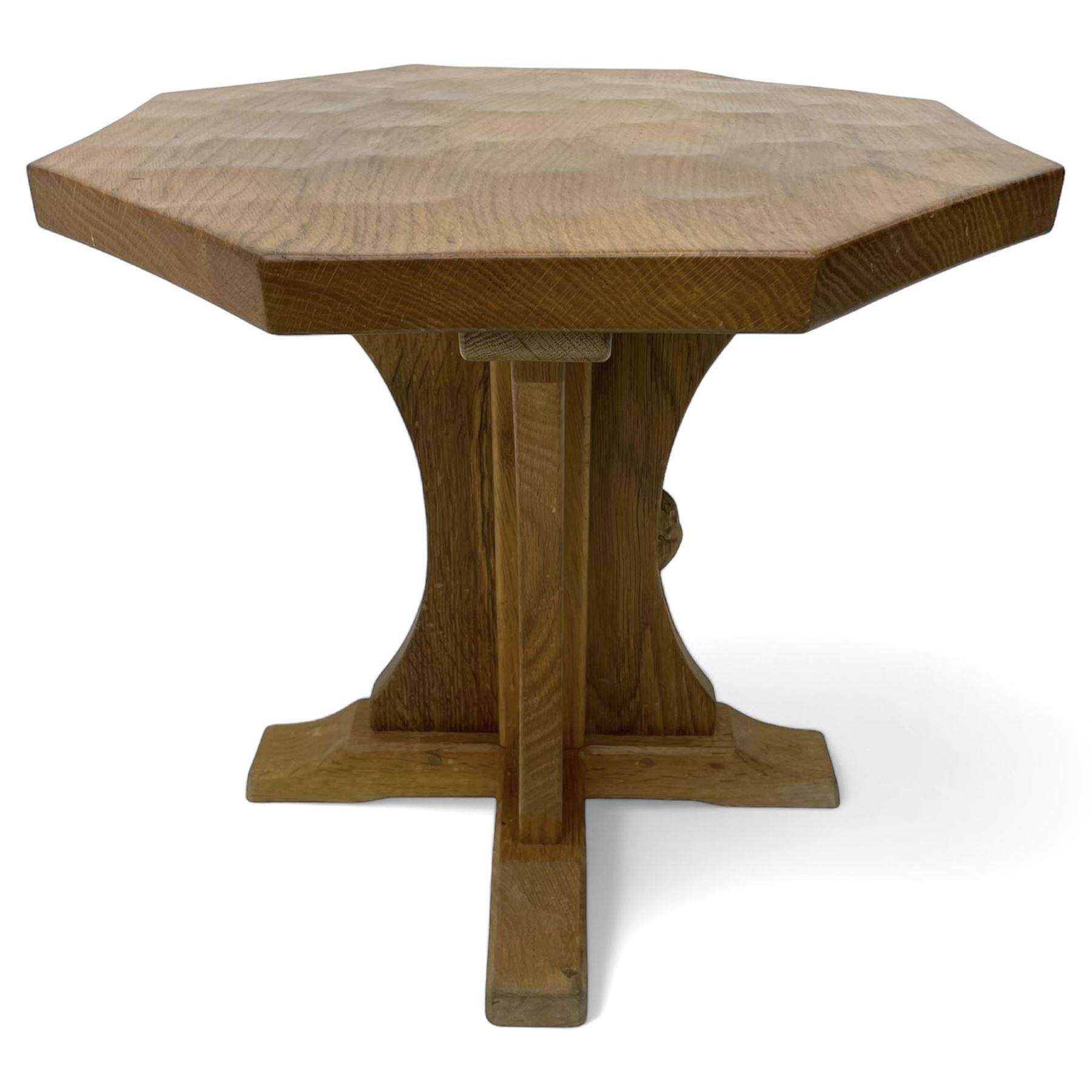 Mouseman - oak occasional table, octagonal adzed top, cruciform pedestal on sledge feet, carved with mouse signature, by the workshop of Robert Thompson, Kilburn 