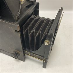 Early 20th century Adams and Co 'Videx' folding plate camera, in original leather carrying case, with various quarter plates