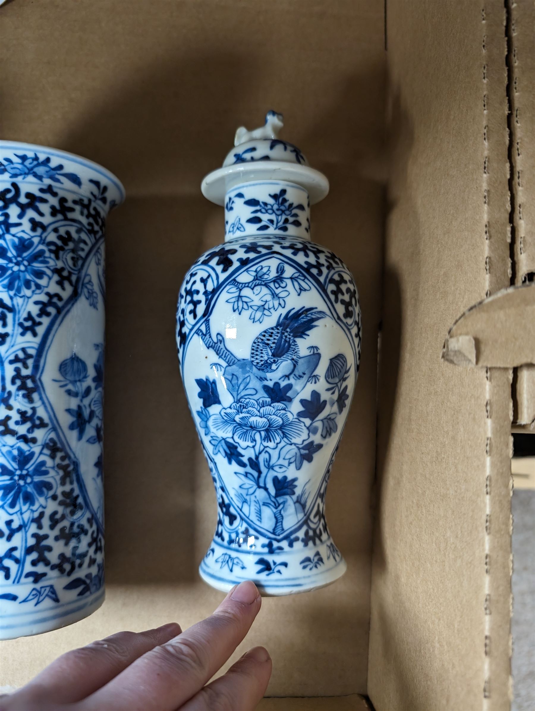 Pair of blue and white vases, together with matching vase and cover and other ceramics