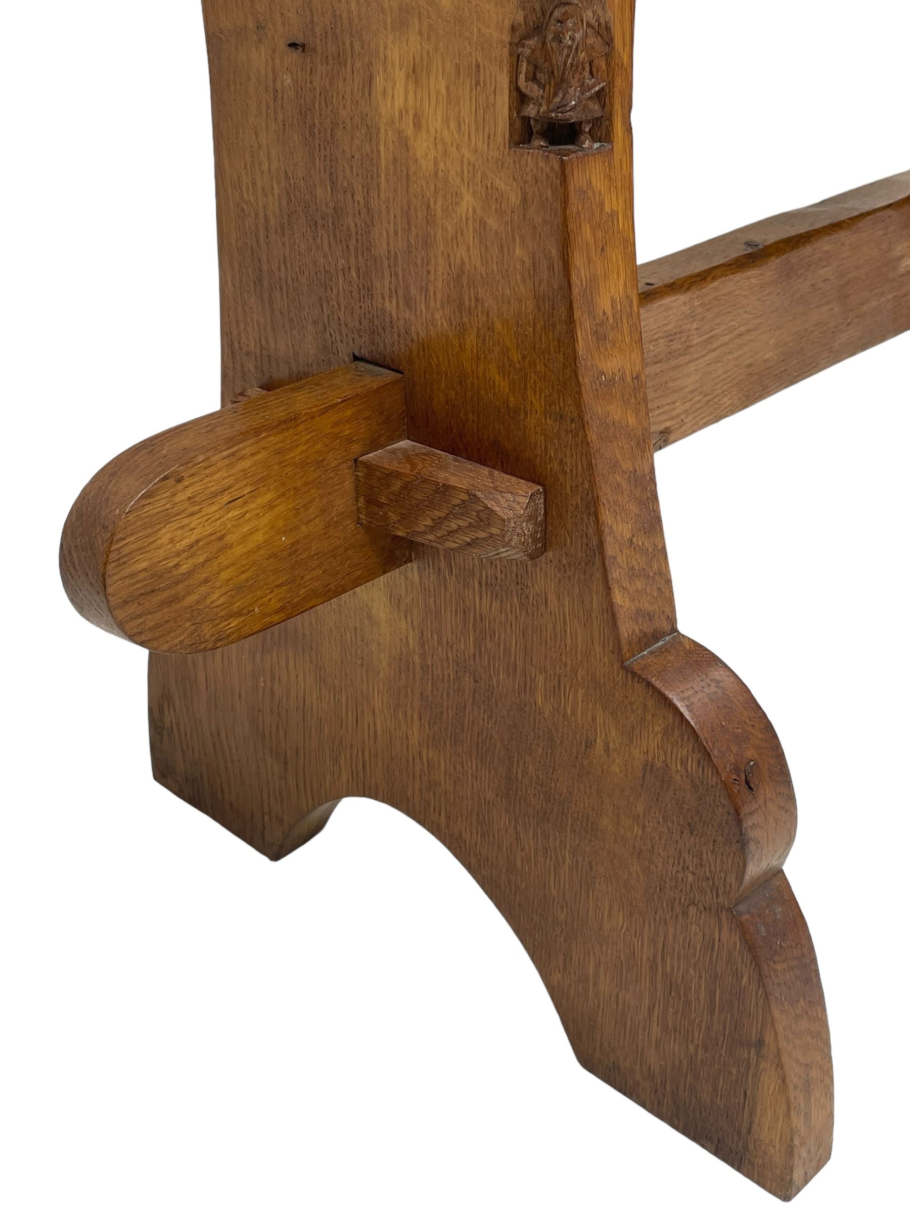 Gnomeman - oak side table, rectangular adzed top over two drawers, on shaped end end supports united by pegged stretcher, carved with gnome signature, by Thomas Whittaker, Littlebeck 