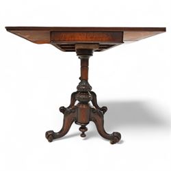 Victorian figured walnut card table, moulded rectangular fold-over swivel top with baize-lined interior, on twin turned pillar supports carved with stylised foliate motifs, united by turned stretcher, on splayed shaped feet with scrolled carved terminals, brass and ceramic castors 