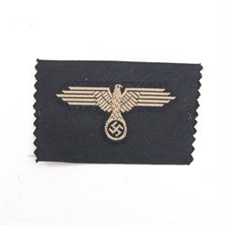 Third Reich SS field cap insignia, machine-woven SS Eagle, on black rectangle, H5cm, L7cm 