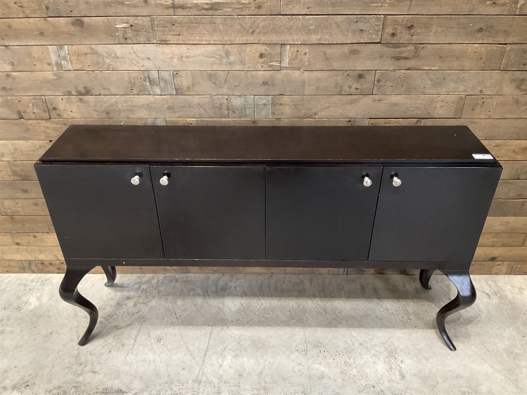 Rosewood finish four door sideboard, on cabriole legs