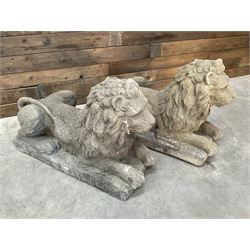 Pair of large cast stone Langport recumbent garden lions, rectangular plinth base