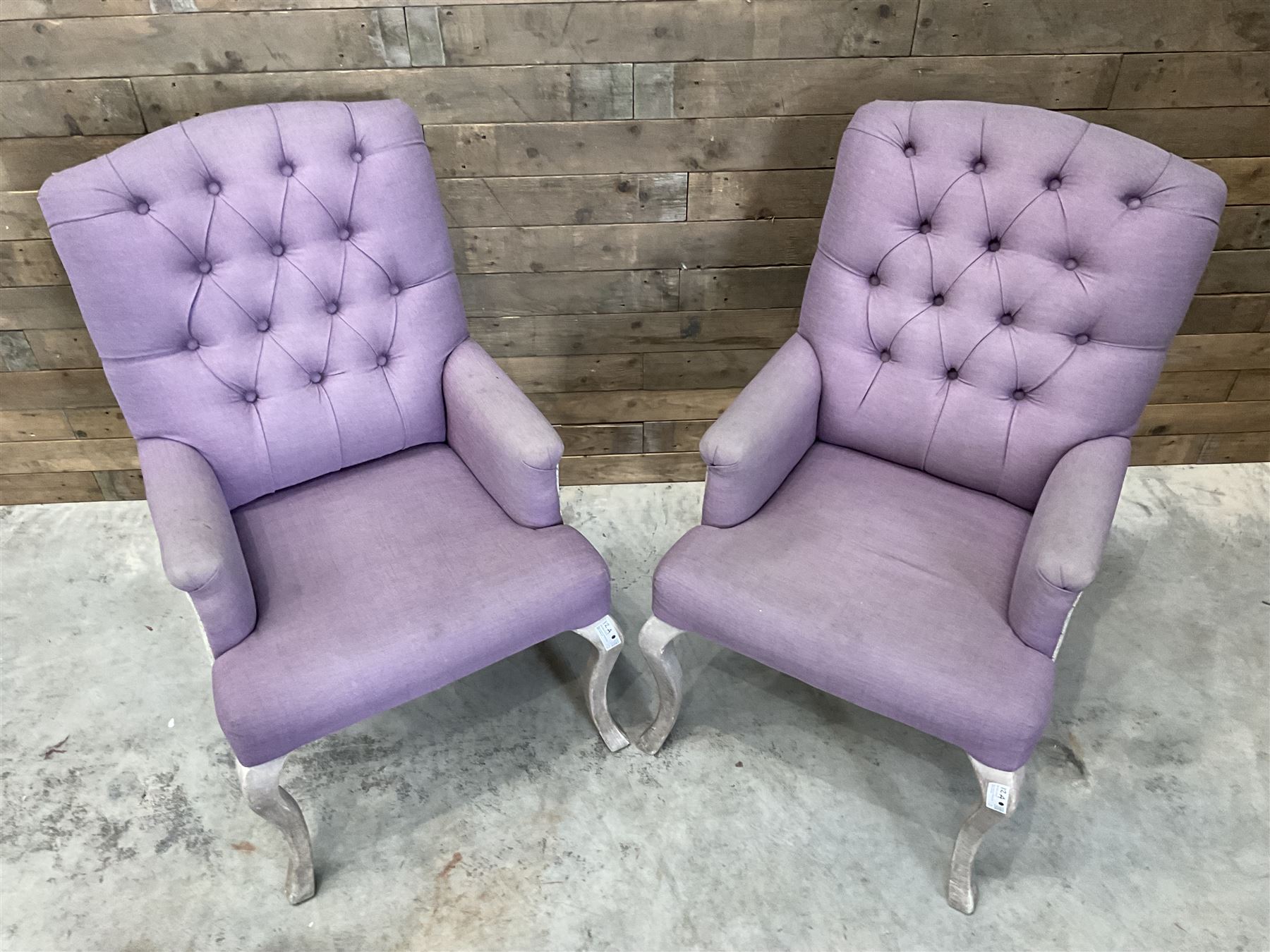 Voyage - two high back armchairs upholstered in buttoned lilac and tweed fabric, painted cabriole legs