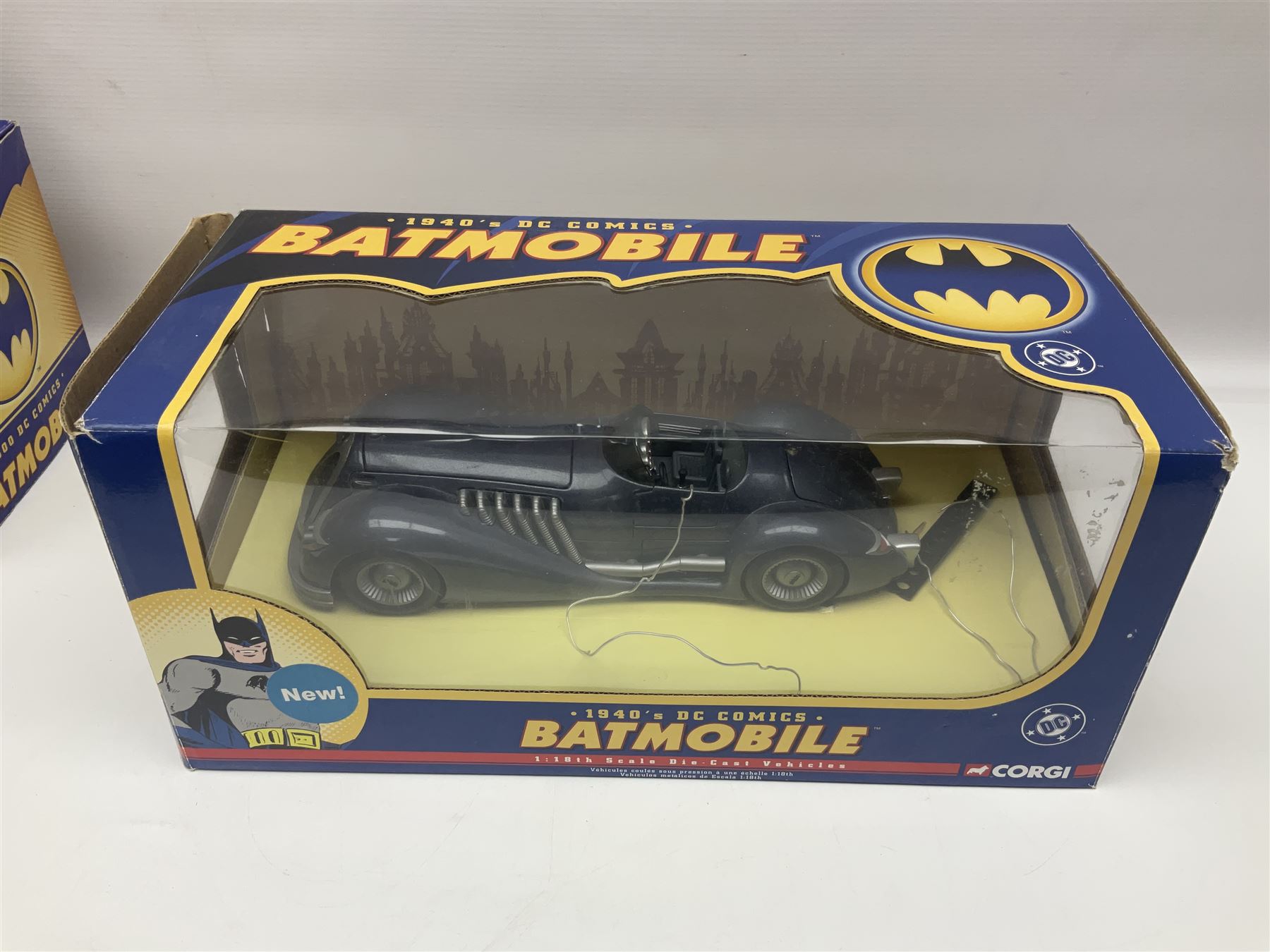 Five Corgi Batmobile die-cast vehicles from the DC Comics collection, to include 1940’s DC Comics BMBV2 1:18 and BMBV1 1:24 scale Batmobiles, all in original boxes 