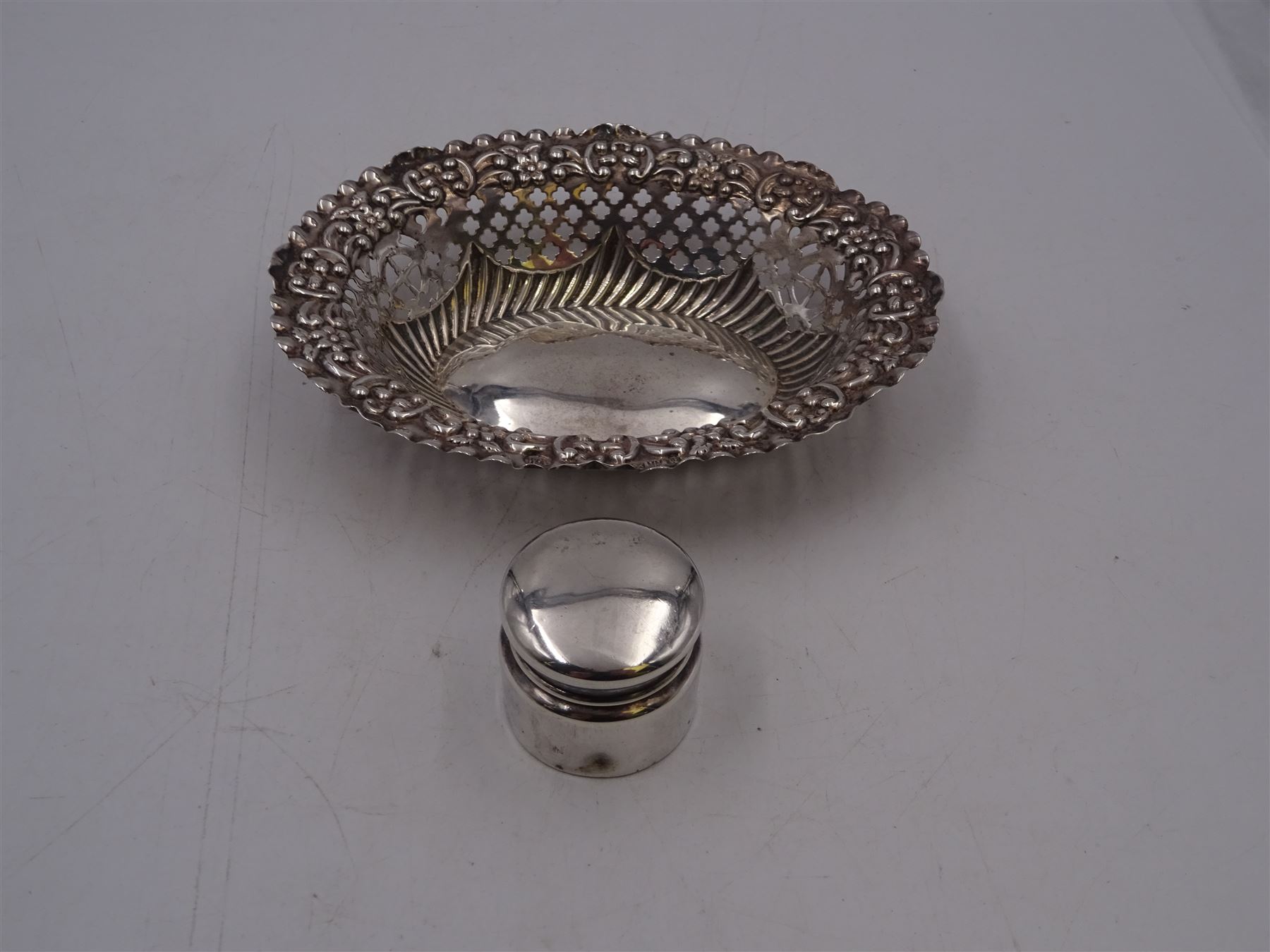 Small Victorian silver box, with rounded cover, hallmarked M Bros, Birmingham 1898, together with a Victorian silver pierced dish, hallmarked William Aitken, Chester 1899, dish W13cm