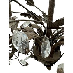 India Jane Interiors - contemporary wrought iron chandelier, adorned with vine and leaf motifs intertwined with faceted glass crystal drops, curved arms supporting six candle-style light fittings, the central stem terminating in a suspension loop