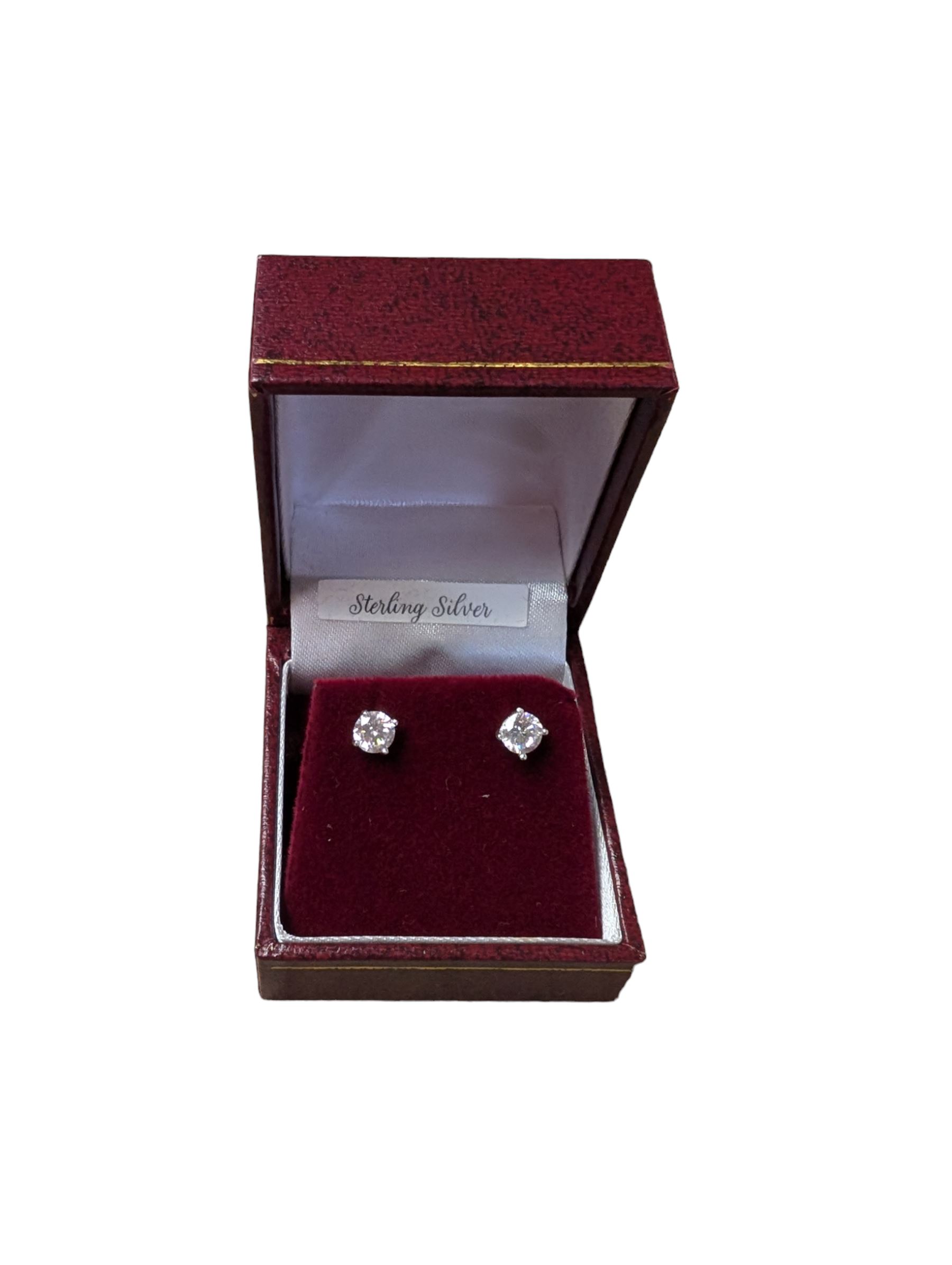 Pair of silver cubic zirconia stud earrings, boxed 