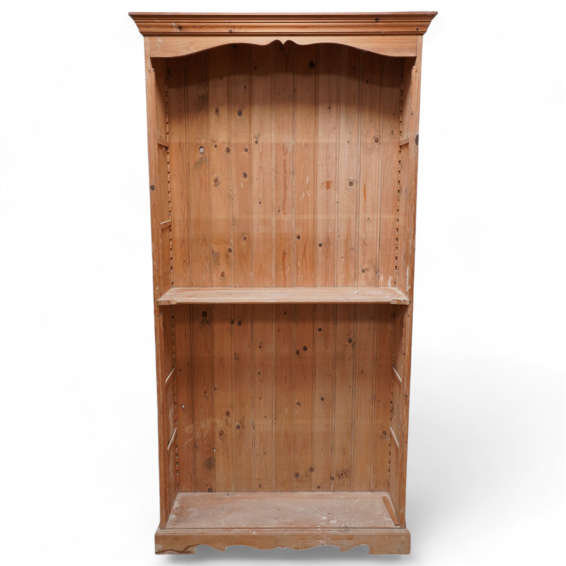 20th century rustic pine tall open bookcase, projecting cornice over shaped frieze