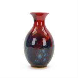 Early 20th century Royal Doulton 'Sung' flambe vase, of baluster form with mottled green/blue decoration upon a red ground, signed FM, Noke and Sung beneath, with Royal Doulton backstamp, H16cm