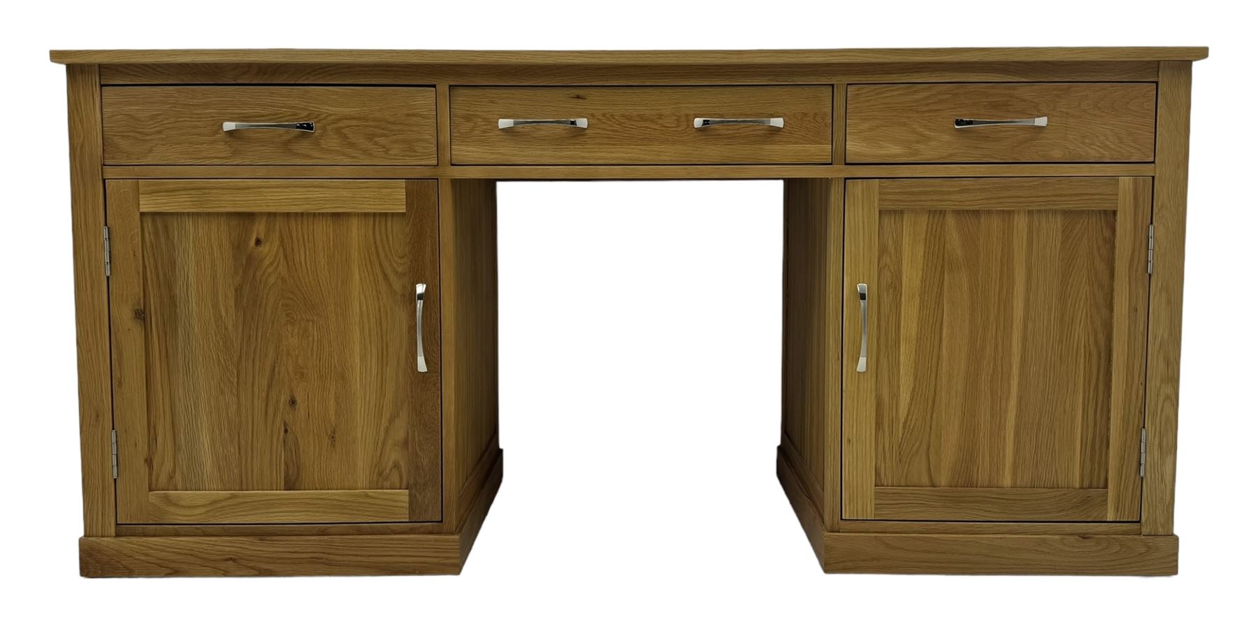 Contemporary light oak twin pedestal desk, fitted with three drawers over two cupboards with chrome handles, the central drawer with hinged front panel revealing pull-out keyboard tray, on plinth base