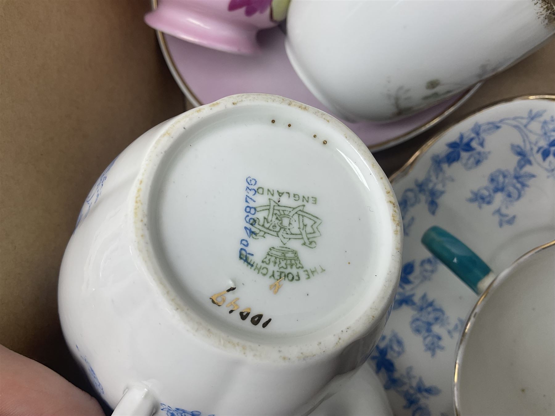 Collection of 19th century and later moustache cups, mostly with matching saucers, including hand painted examples