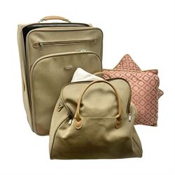 Shilton suitcase on wheels and matching travel bag, together with four cushions