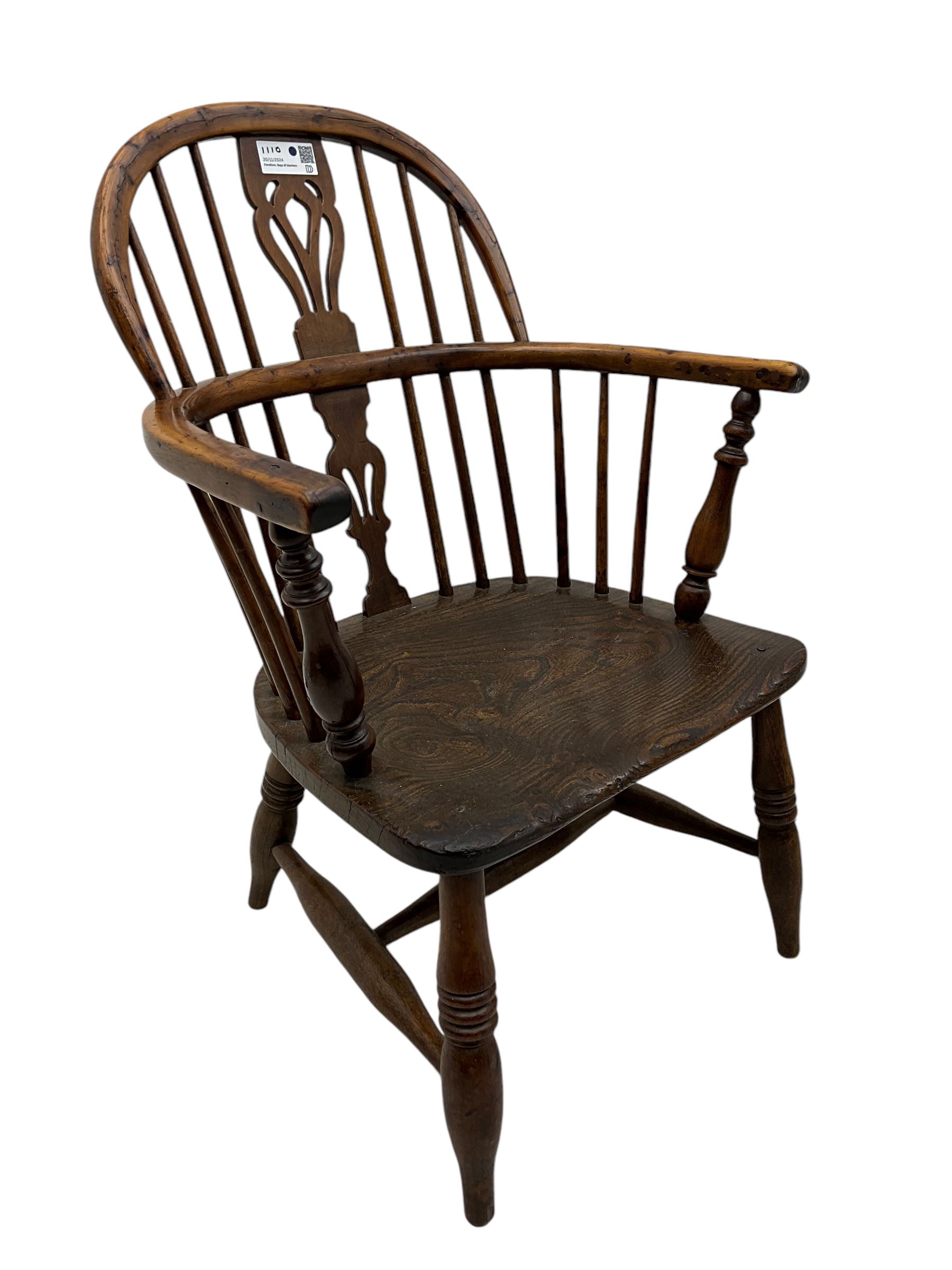 19th century elm and ash Windsor armchair, double hoop and stick back with shaped and pierced splat, on turned supports united by swell-turned H-stretchers (W60cm, H108cm); 19th century elm and yew wood Windsor chair (W57cm) (2)