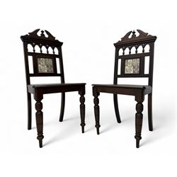 Pair of late Victorian oak hall chairs, shaped pediment over spindle turnings and tiled ba...