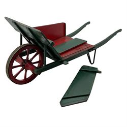 19th century green and red painted wooden wheelbarrow, flat bed with removable sides and back, wooden and wrought metal strap wheel 