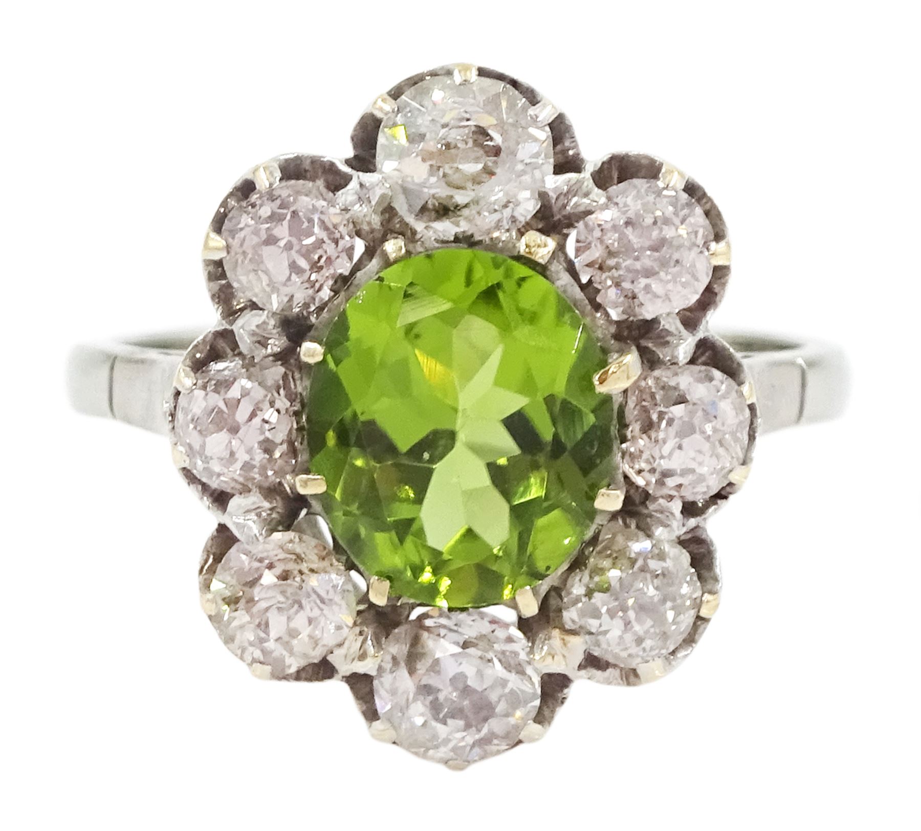 18ct white gold oval cut peridot and old cut diamond cluster ring, stamped 18ct, total diamond weight approx 1.20 carat