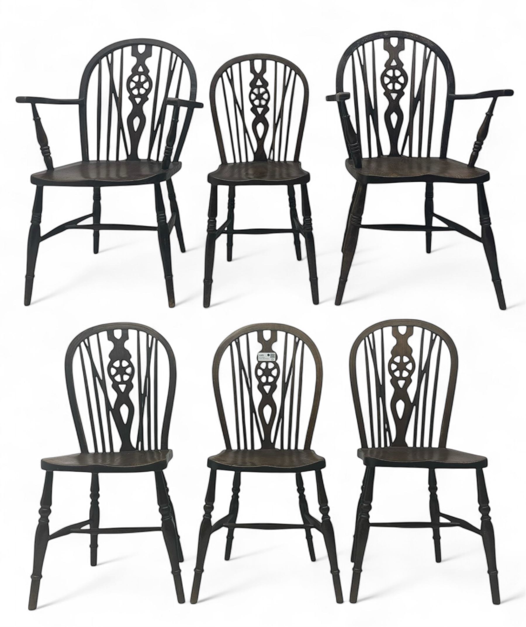 Set of six 19th century elm and ash dining chairs, hoop back with pierced wheel-shaped central splat, shaped saddle seat, raised on turned supports united by H-stretchers