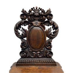 19th century oak hall chair, shaped and pierced back carved with crown cresting over curled and scrolled acanthus leaves, tapered rectangular seat with foliate carved corners and fluted chamfered edge, on turned and lobe carved splayed supports 