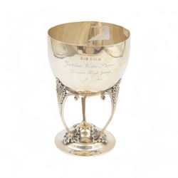 1920s silver trophy cup, of goblet form, the plain bowl with presentation engraving, held ...