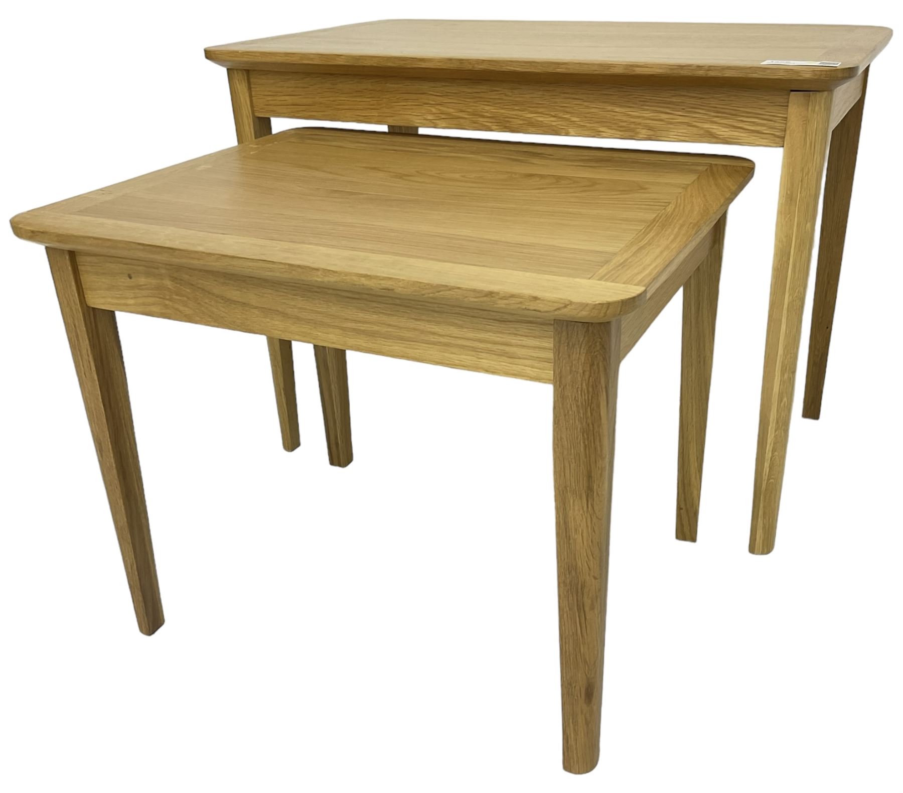 Contemporary light oak nest of two tables, rectangular top over tapering supports