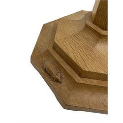 Mouseman - oak standard lamp, octagonal tapered stem on stepped and moulded octagonal base, carved with mouse signature, by the workshop of Robert Thompson, Kilburm 