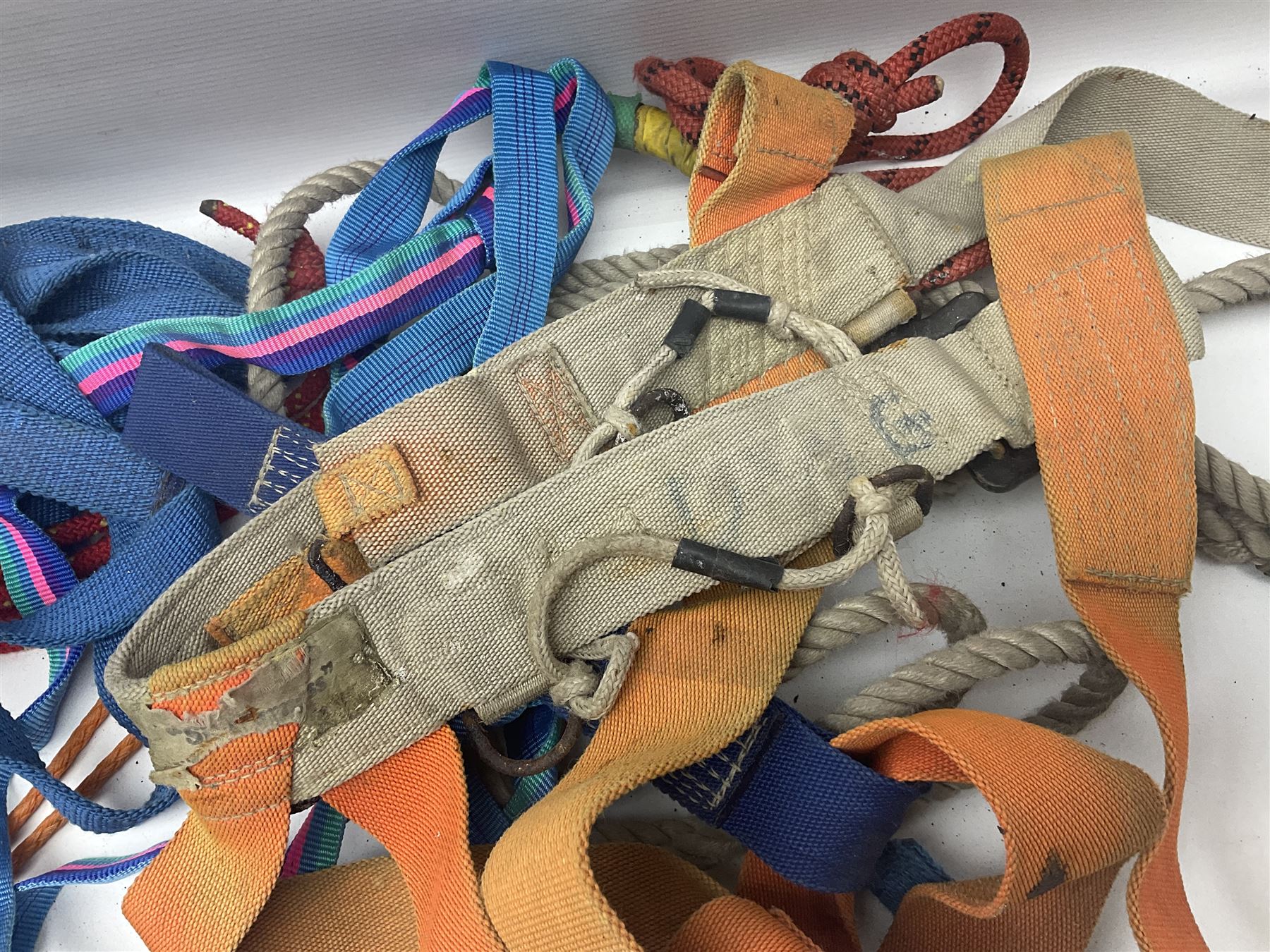 Collection of 1960s/70s climbing equipment including two original Hamish McInnes Pterodactyl ice axes, Joe Brown helmet, carabiners, ropes and wires etc