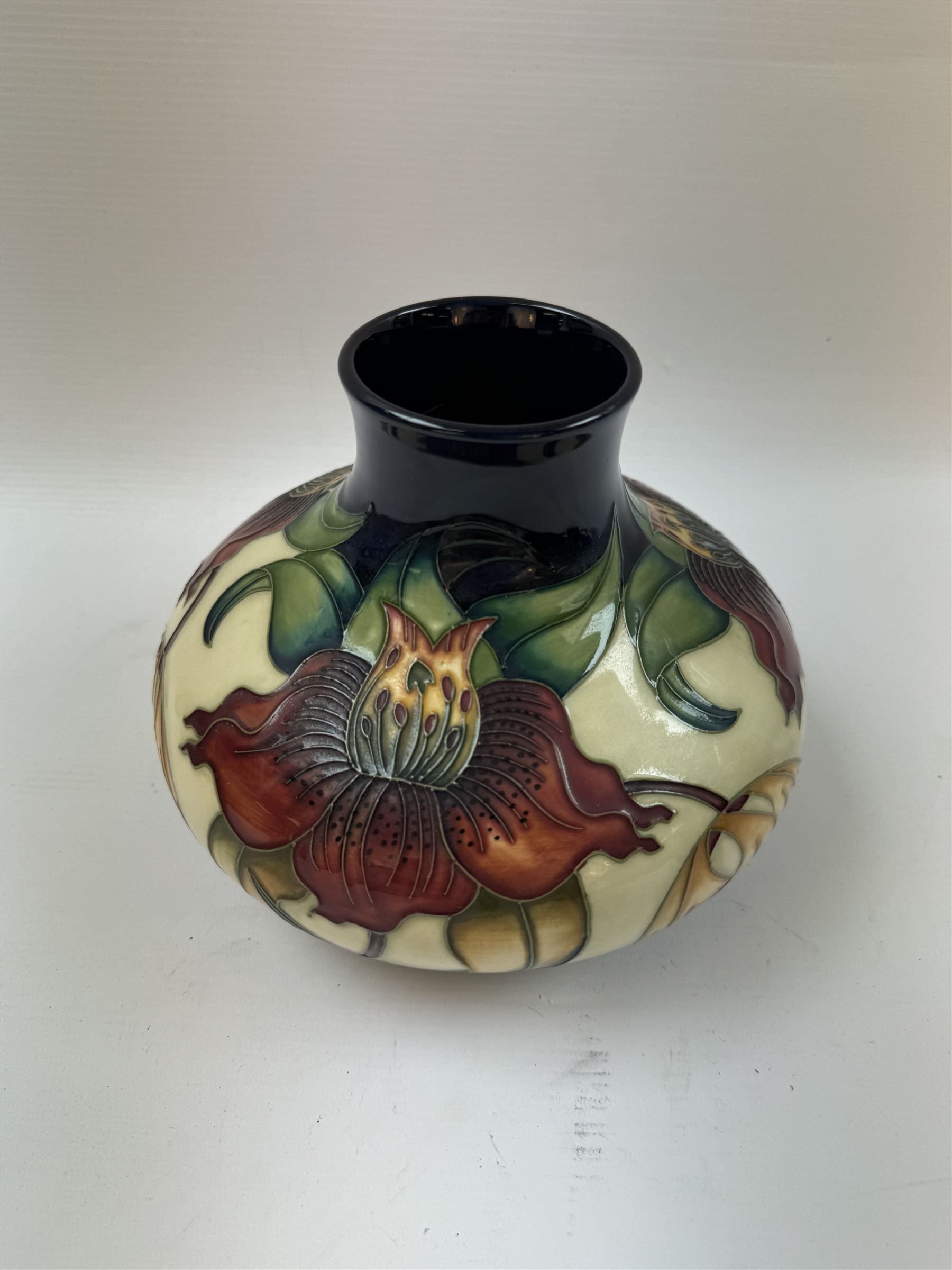 Moorcroft vase of squat baluster form, decorated in the Anna Lily pattern designed by Nicola Slaney, H15.5cm