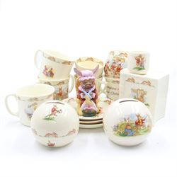 Royal Doulton Bunnykins teawares, including teacups and saucers, egg cup, money boxes etc (12)