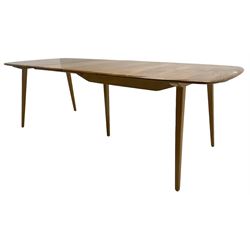 Ercol - light elm and beech 'Slide Leg Expanding Dining Table (444)', rectangular top with rounded corners, raised on tapered splayed supports, with two additional leaves