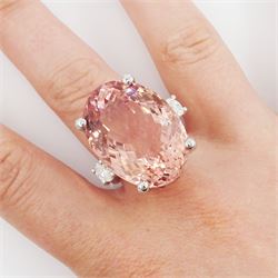 Platinum three stone large oval cut morganite and oval cut diamond ring, hallmarked, morganite 33.80 carat, total diamond weight 0.60 carat, with World Gemological Institute report