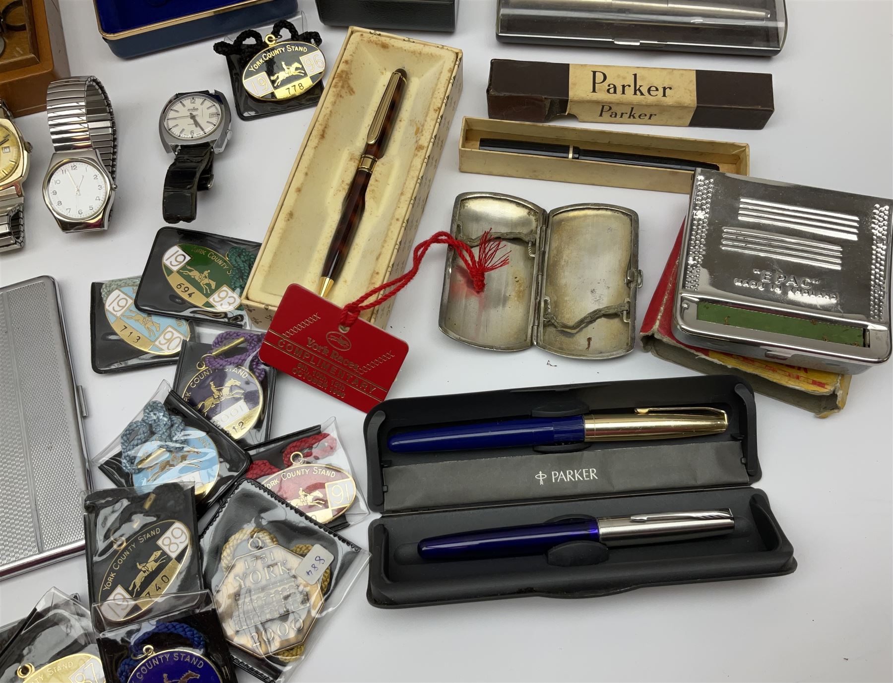 Collection of watches, including Pulsar, Seiko, Cartier, together with Henry Morell cufflinks, cigarette cases, and a group of Parker pens. 