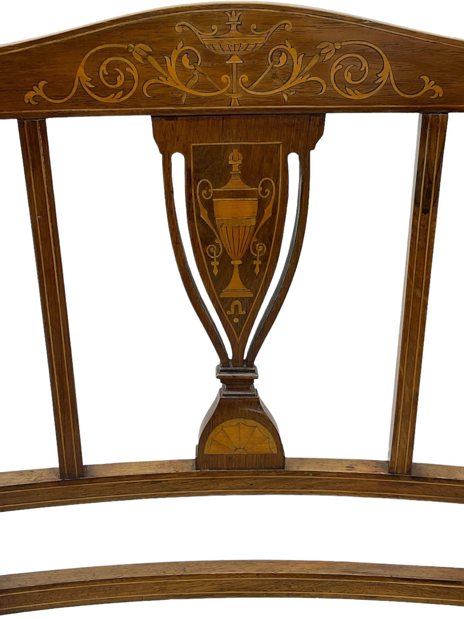 Early 20th century mahogany side chair, detailed marquetry frame, backrest with central urn motif and scrollwork inlay, arched crest rail with floral designs, cream and gold patterned fabric seat, turned front legs with brass castors (H78cm); Victorian walnut nursing chair, carved crest rail, floral needlepoint tapestry upholstery, turned front legs with ceramic castors (H81cm)