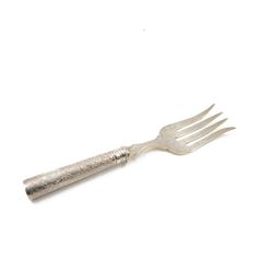 German silver handled four pronged fish serving fork, the tapering cylindrical handle with...