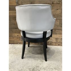 Four ebonised framed tub shaped armchairs, upholstered in grey fabric