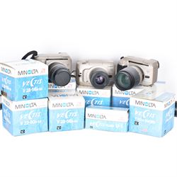 Four Minolta Vectis cameras bodies, to include two Vectis S-1 examples, serial nos. 96622420 & 02629088 and two Vectis S-100 examples, serial nos. 98713950 & 98704095, together with a collection of Minolta Vectis accessories and lenses, including boxed examples