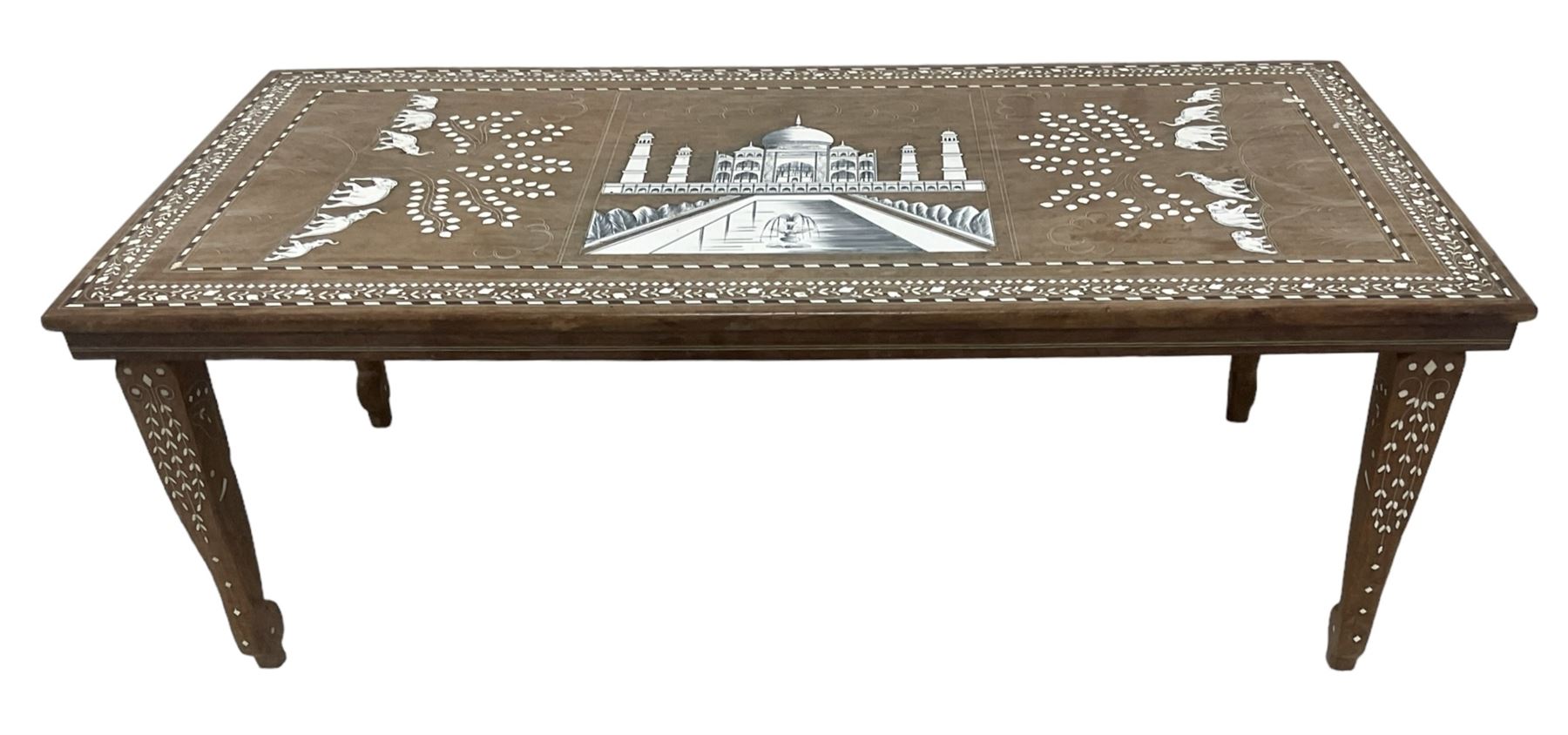 20th century Indian inlaid hardwood coffee table, rectangular top decorated with simulated ivory inlays depicting the Taj Mahal and elephants