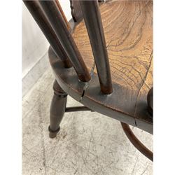 19th century yew wood and elm Windsor chair, low hoop stick back with pierced splat, dished seat raised on ring turned supports joined by crinoline stretcher