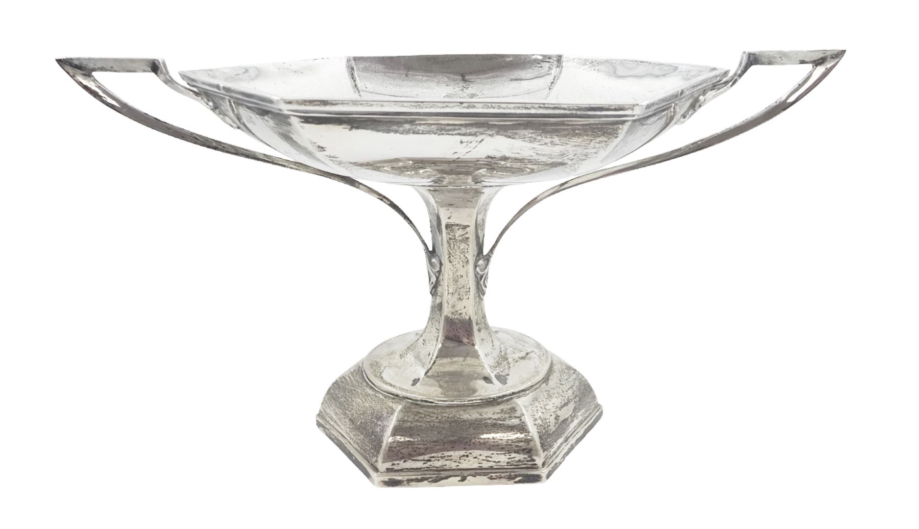 Early 20th century twin handled pedestal dish, of hexagonal form, with Art Nouveau inspired foliate mounted handles, upon a domed hexagonal foot, hallmarked Walker & Hall, Sheffield 1919, including handles H16.5cm