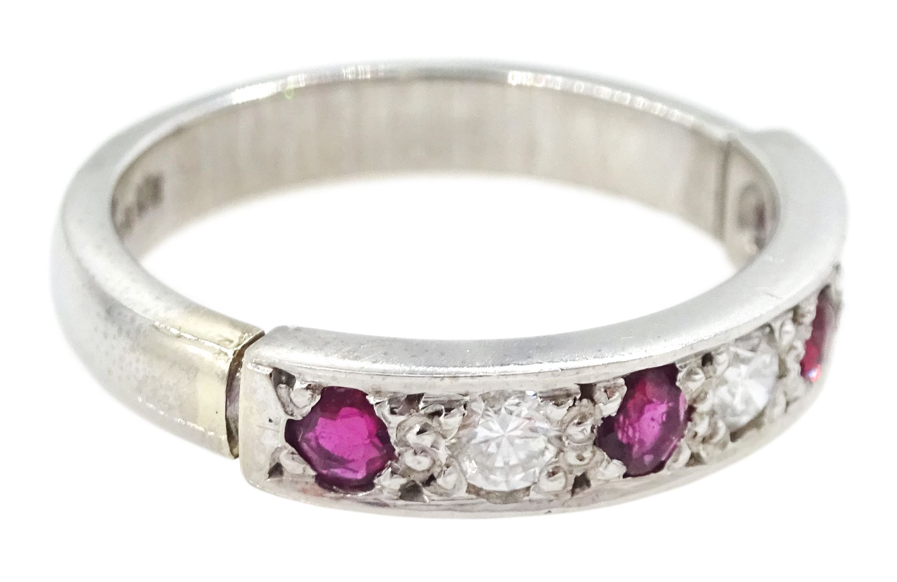 18ct white gold seven stone round brilliant cut diamond and ruby half eternity ring, Sheffield 1994, total diamond weight approx 0.20 carat