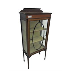 Edwardian inlaid mahogany display cabinet, shaped and raised back over single astragal glazed door, interior lined and fitted with two shelves, raised on square tapering supports