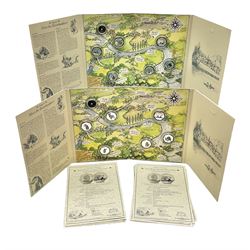 Two Queen Elizabeth II Ascension Island 2021 Wind in the Willows seven coin sets, both with 'Toad's Last Little Song' 24ct gold fifty pence weighing 2.25 grams, includes both layered in pure silver and fine .999 silver fifty pence pieces, housed in a presentation folders with certificates