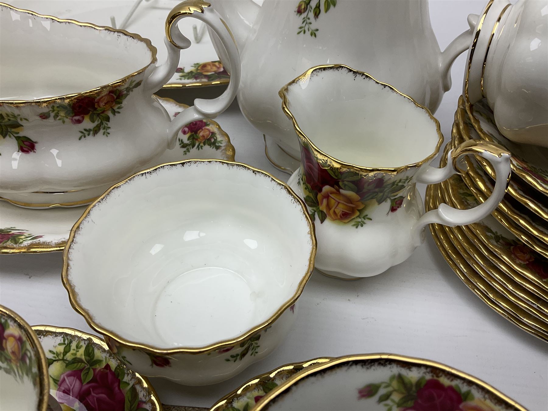 Royal Albert Old Country Roses pattern tea and dinner service, including teapot, coffee pot, two milk jugs, two open sucriers, six teacups and saucers, six dinner plates, six soup bowls, etc  