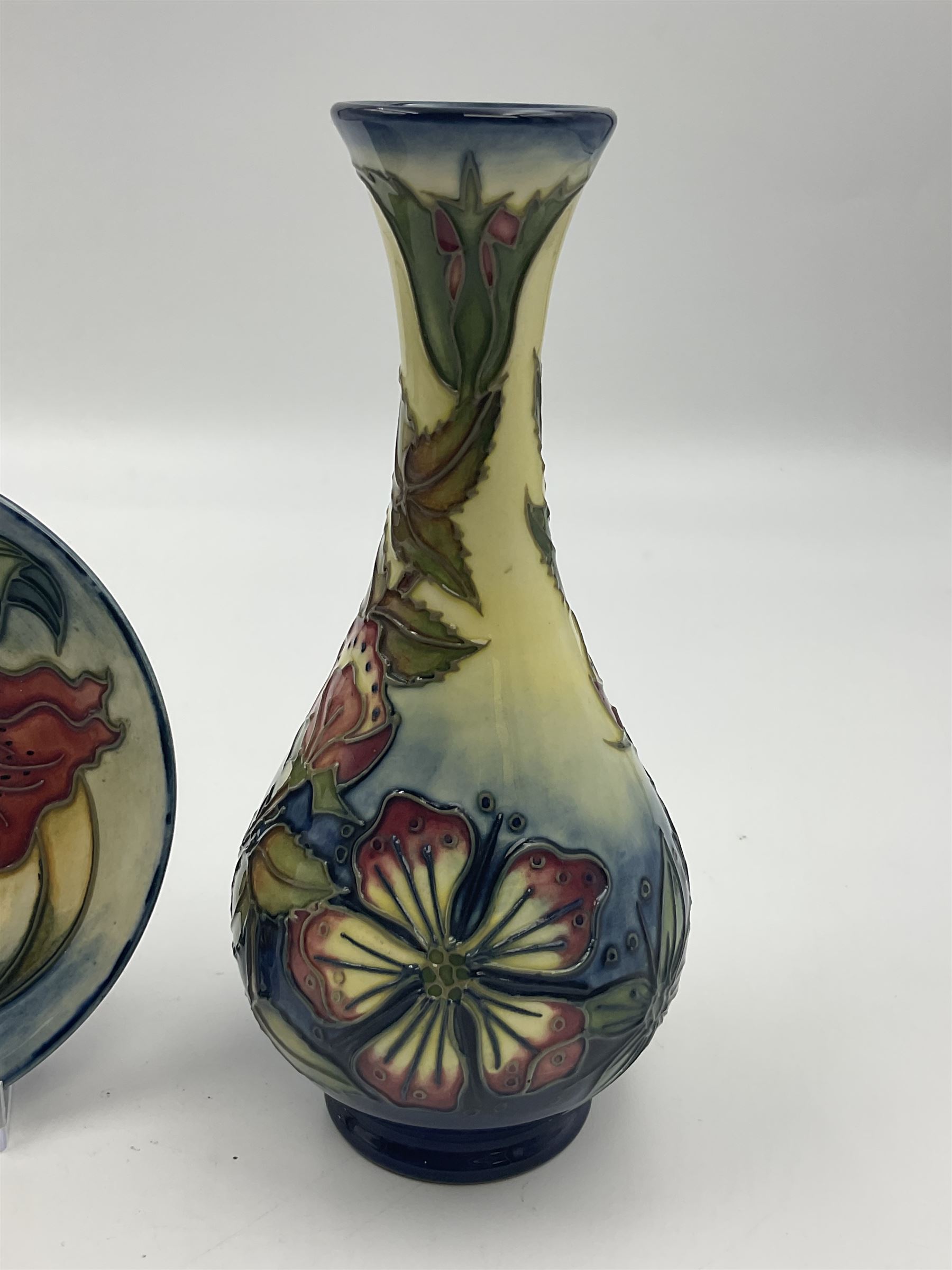 Moorcroft vase, of bottle form, decorated in the Sweet Briar pattern by Rachel Bishop, dated 1997, H7cm, together with a Moorcroft pin dish decorated in the Anna Lily pattern, D12cm (2)