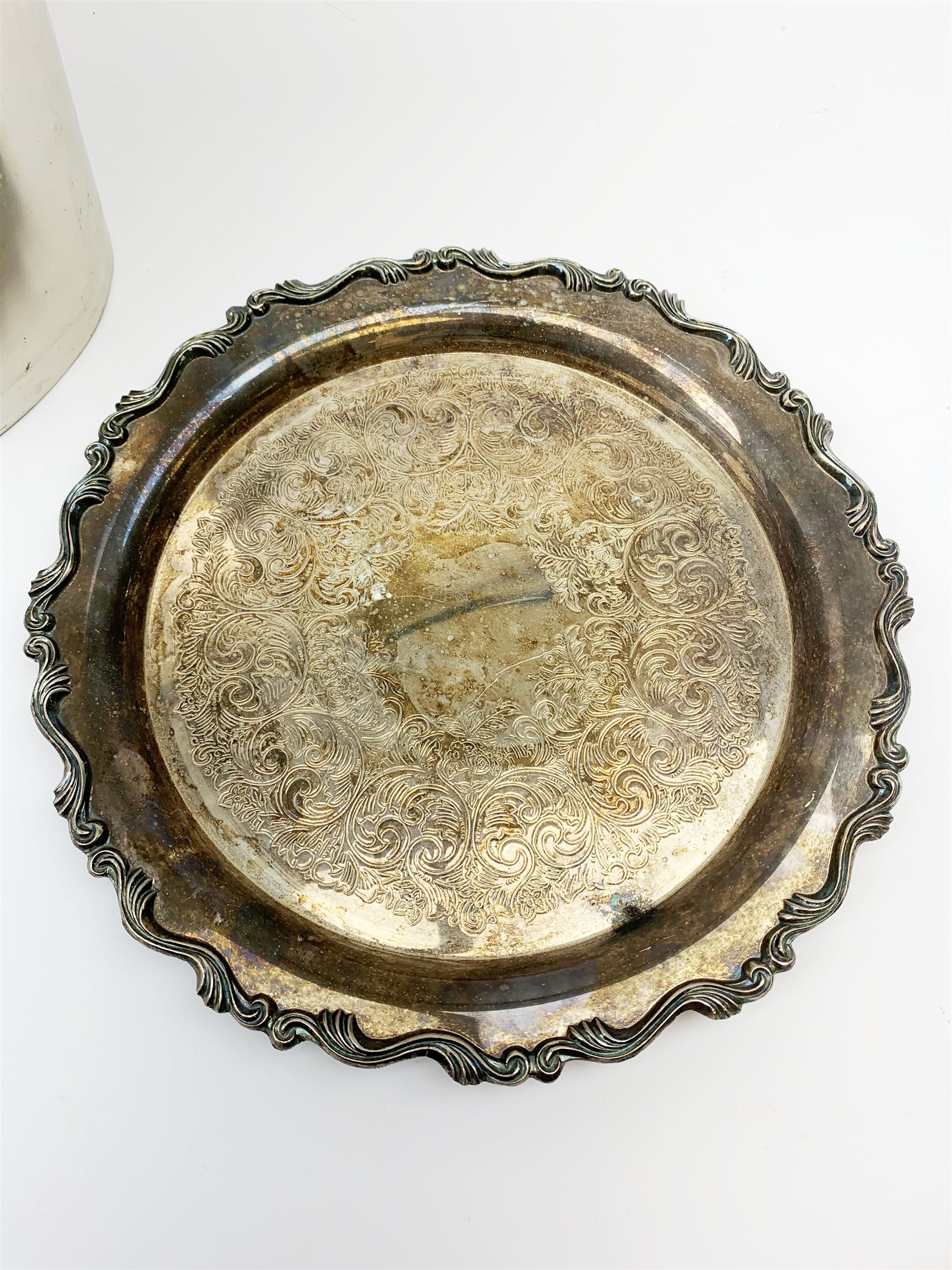 A twin handled twin bottle wine cooler, marked to front and back Grand Hotel Saint Germain-des-Pres 1925, excluding handles L32cm, together with a silver plated salver, D31.5cm. 