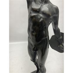 After Franz Iffland, bronzed figure, modelled as a man with fist raised holding a shield, signed to base, upon an octagonal base, H37cm