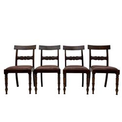 Set of six (4+2) early 19th century mahogany dining chairs, figured bar back over rose and curled leaf carved middle rail, drop-in seats upholstered in brown fabric, on turned front supports 